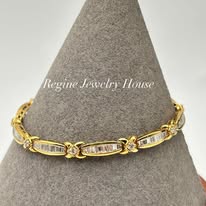 Gold & Baguette Diamond "XOXO" Link Bracelet Highlights: