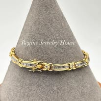 Gold & Baguette Diamond "XOXO" Link Bracelet Highlights: