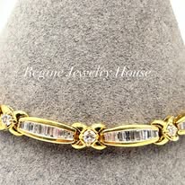 Gold & Baguette Diamond "XOXO" Link Bracelet Highlights: